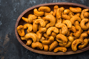 Masala Kaju or spicy Cashew in a bowl. Popular festival snack from India/asia, also known as Chakna...