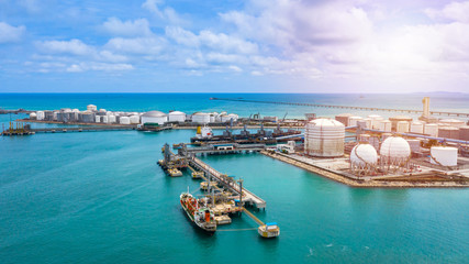 Aerial view white storage tank of oil and gas and petrochemical products ready for logistic and...