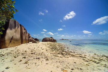 Sandy beach on the shore of La Digue island, Seychelles