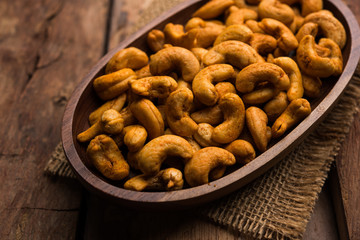 Masala Kaju or spicy Cashew in a bowl. Popular festival snack from India/asia, also known as Chakna recipe