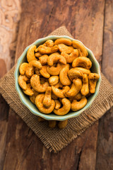 Masala Kaju or spicy Cashew in a bowl. Popular festival snack from India/asia, also known as Chakna recipe