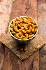 Masala Kaju or spicy Cashew in a bowl. Popular festival snack from India/asia, also known as Chakna recipe