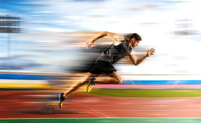 Man running on the athletic track - obrazy, fototapety, plakaty