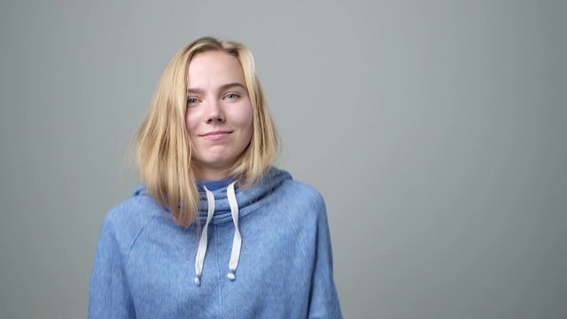 Who, me concept. Annoyed young female looking at camera asking ae you talking to me. Negative human facial emotions