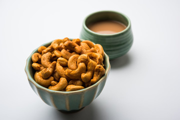 Masala Kaju or spicy Cashew in a bowl. Popular festival snack from India/asia, also known as Chakna recipe