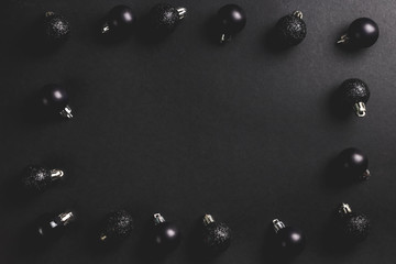 Christmas decorations on black background.