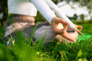 Close-up of girl's hands during yoga