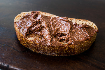 Homemade Cream Chocolate Hazelnut Spread with Bread Slice.