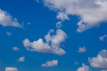 White clouds in a blue sky