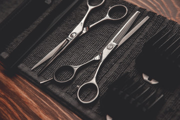 Barber shop background for men beauty salon, hairdresser tools scissors and comb, copy space