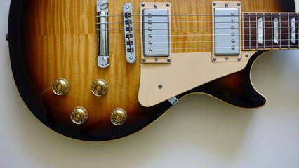electric guitar. color background . closeup - obrazy, fototapety, plakaty