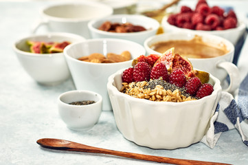 Oatmeal porridge with raspberry and figs in a bowl