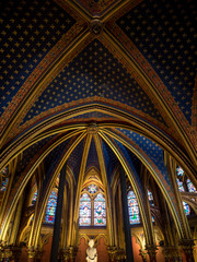 PARIS - May 2018: The Sainte Chapelle in Paris, France. This 1246 inspired monument features 15 wonderful stain-glass windows in Paris.