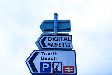 Writing note showing Digital Marketing. Business concept for market products or services using technologies on Internet Business concept with empty copy space on the road sign