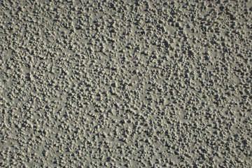 wall with stucco and light shade