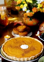 pumpkin traditional pie for Thanksgiving. refreshments on the festive table. autumn dessert . celebrating the harvest day