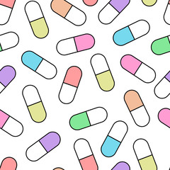 Vector seamless pattern of colourfull pills on white background