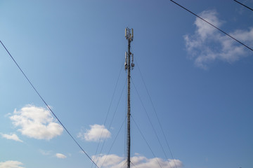 Cellular repeater, mast for broadcasting wireless communication and the Internet
