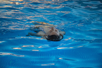 Floating in a pool