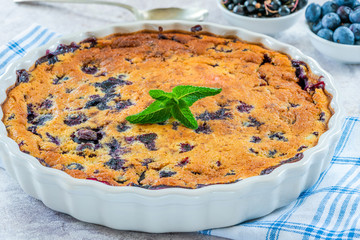 Lemon, blueberry and blackberry clafoutis - delicious baked fruit dessert