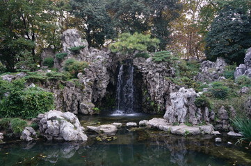 Naklejka na ściany i meble waterfall in Zhan Garden