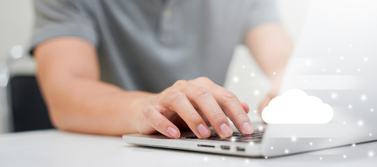 close up man hand typing on keyboard for transfer or synch data upload and download from cloud...