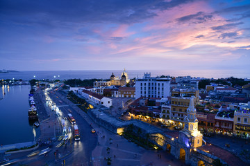 Aerial view old city of Cartagena de Indias with clock tower at sunset. Colombia - obrazy, fototapety, plakaty