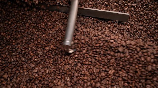 Top view cooling down process freshly roasted coffee beans