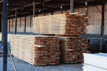 Board production. Board made of wood at the factory. Lumber. Board made of spruce and pine, production.