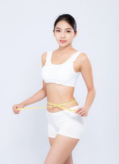 Fototapeta premium beautiful portrait asian woman diet and slim with measuring waist for weight isolated on white background, girl have cellulite and calories loss with tape measure, health and wellness concept.