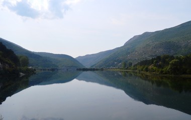 Fototapeta na wymiar a reflection of a calm and clean river