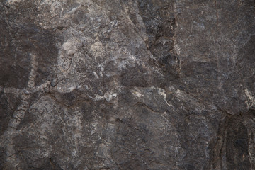 Natural brutal stone background with cracks and creases