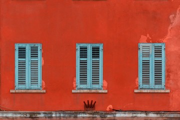 Orange facade with blue windows