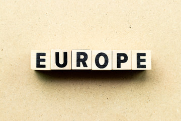 Letter block in word Europe on wood background