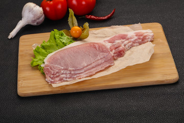 Raw pork bacon