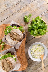 Healthy vegan burger with fresh vegetables and yogurt sauce