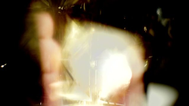 Sparkling, rotating backdrop for titles. Give your footage an extra shine. A bright shiny clean look ideal for science or physics based projects.