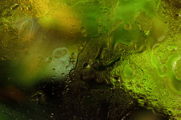 Beautiful liquid background. Background with different drops. Green and aqua elements.