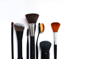 makeup brushes on white background beauty concept, self care, cosmetics store copyscape