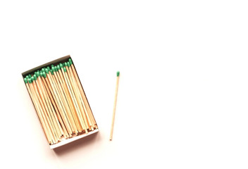  boxes of long matches with green heads on a white background.