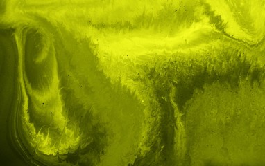 Bright abstract black and yellow acid background with mixed paint. Acrylic texture with arbitrary...