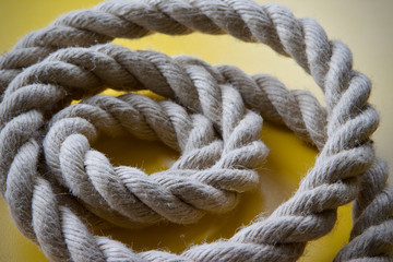 Fototapeta na wymiar A coiled length of natural hemp rope