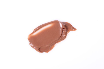 smear of chocolate paste isolated on white