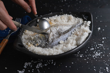 Sparus aurata with salt. Be uncovered bream after baking.