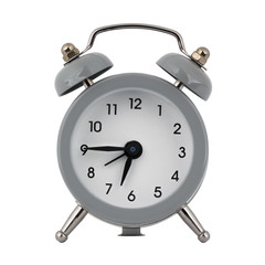 A gray clock with an alarm clock on a white background with arrows showing the time six hours forty five minutes or eighteen hours forty five minutes