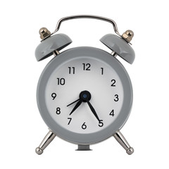 A gray clock with an alarm clock on a white background with arrows showing the time seven hours twenty five minutes or nineteen hours twenty five minutes