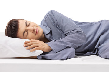 Obraz premium Teenage boy sleeping calmly