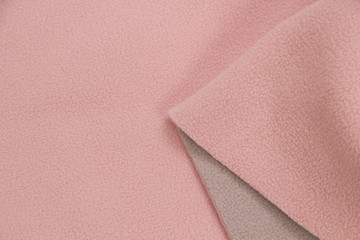Multi-color fleece fabric. Fleece two-tone. The texture of the fleece bedspread.