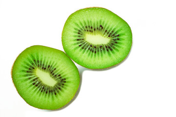 Top view Half of kiwi fruist whit black seeds isolated on white background