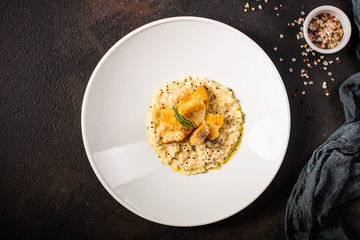 risotto fish (main course rice with seafood) menu concept. food background. copy space. Top view